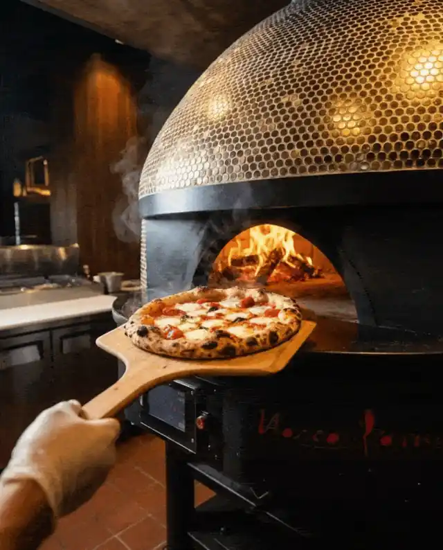 Neapolitan pizza pulled from the Marra Forni golden oven at 700°